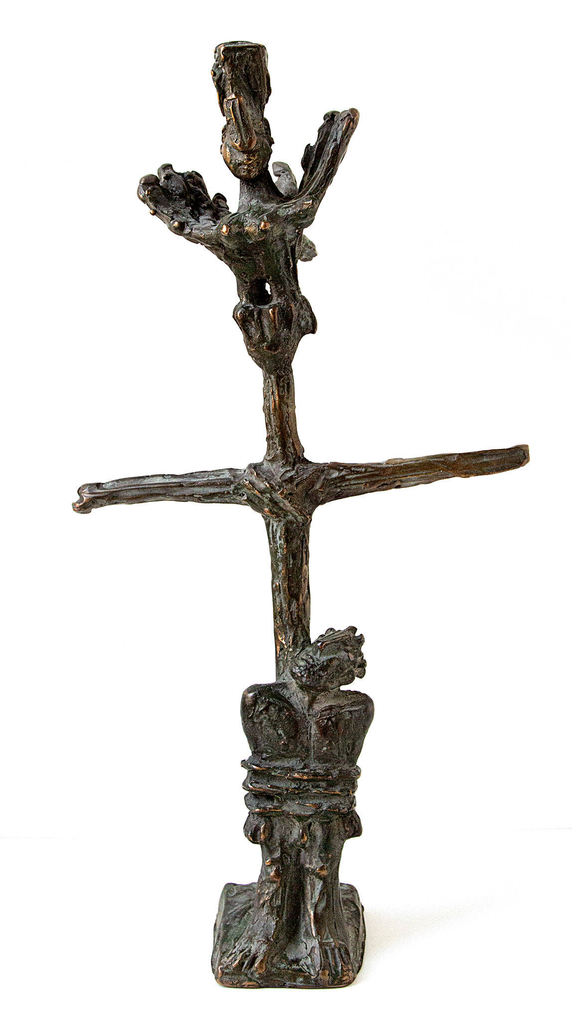 Bronze sculpture of the mast of a ship with a woman/bird hybrid (siren) perched above.